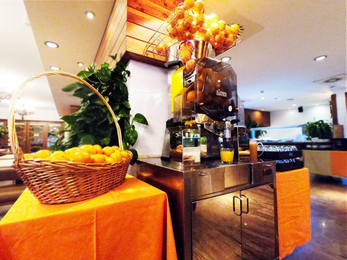Hotel Apartamentos Bajondillo 托雷莫利诺斯 外观 照片 "Orange juice is good for health"